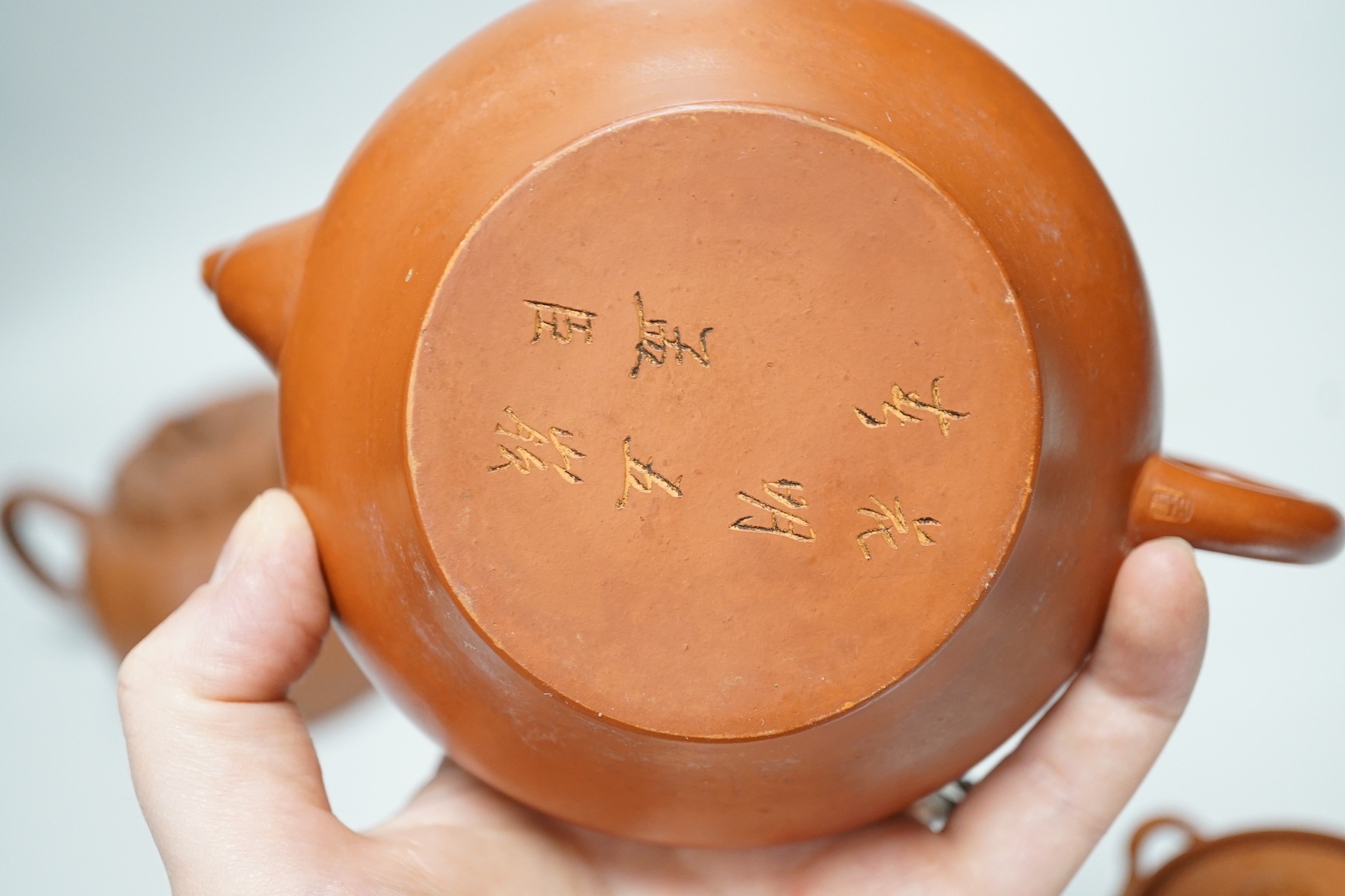 Four Chinese Yixing pottery teapots, tallest 10cm
